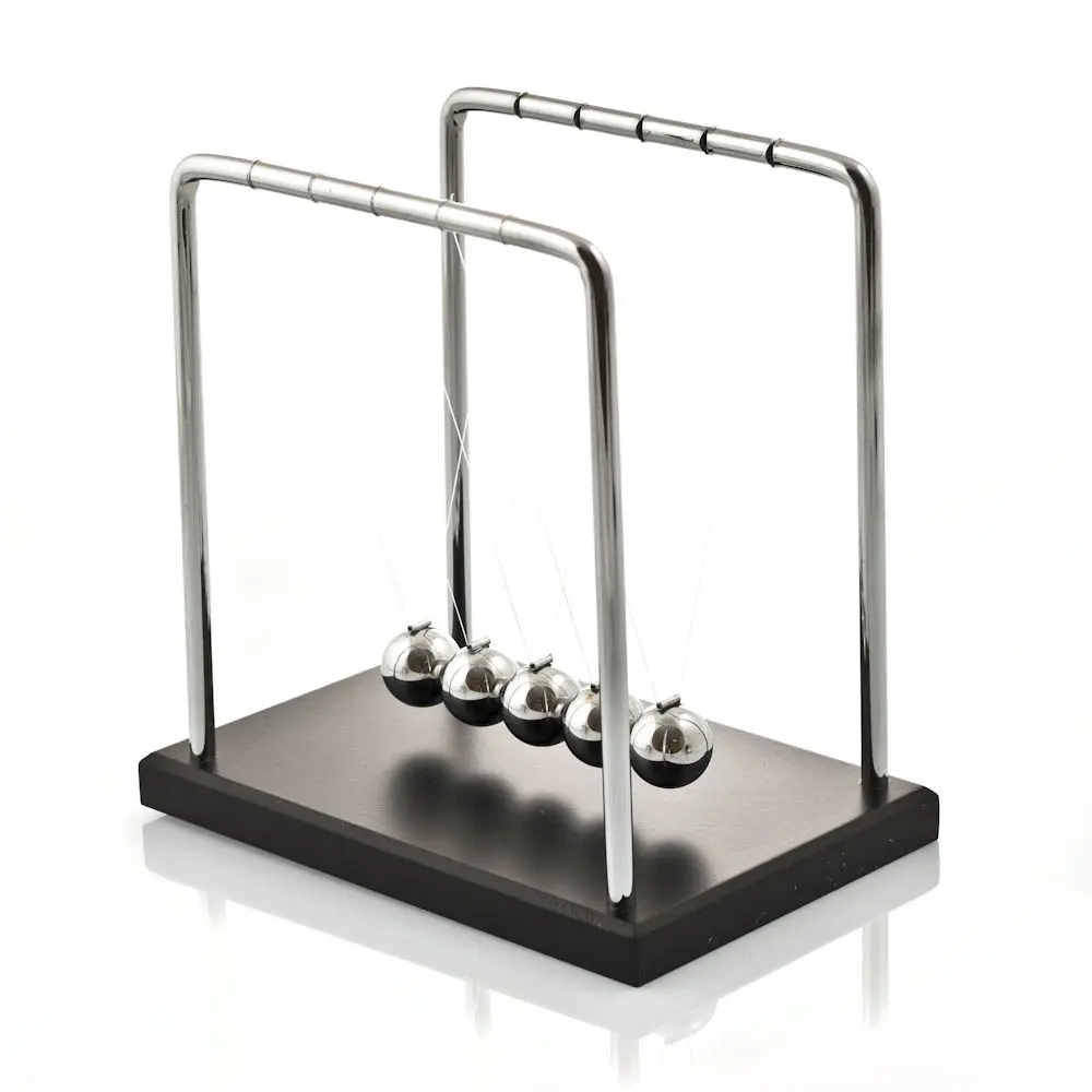 The Source Newton's Cradle